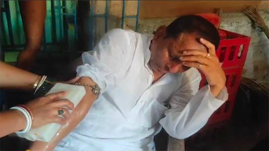The MLA was injured in the waist as a result of being pushed and thrown
