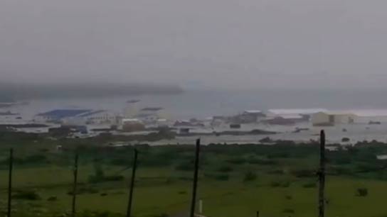 First tsunami waves hit Russia coast after quake