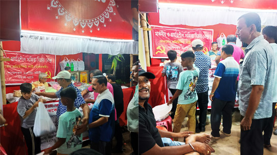 The party's book stall in front of the church opposite Hedua Park in Ward No. 26 of CPIM Shyampukur-2 Area Committee was filled with chatter on the evening of Saptami today