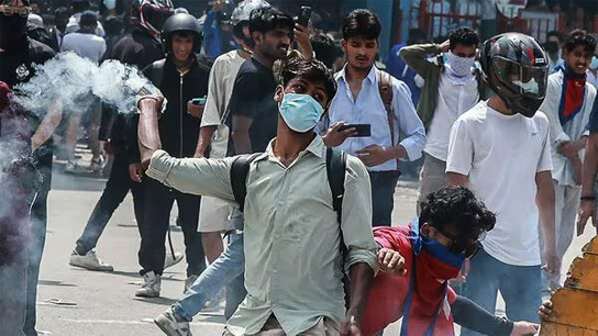 Protest in nepal now nepals home minister offers resignation