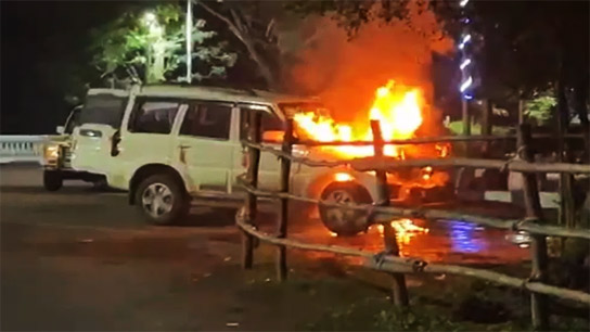 A car caught fire on the road in Kolkata