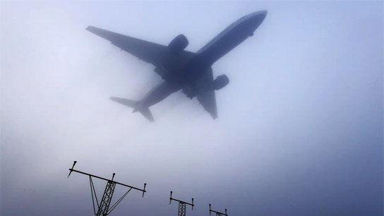 Bitter cold, dense fog; many flights canceled in multiple cities