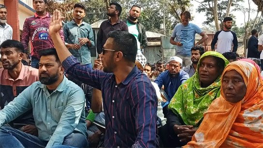 Locals hold protest march demanding cancellation of canal land settlement in the name of land office driver in Amtoli, Bangladesh
