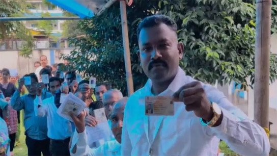 Trinamool candidate stopped in front of EVM with ink on his finger