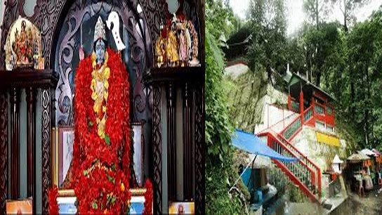 A temple painted in red, white and green on a hill on the banks of the Teesta River on National Highway 31 from Siliguri to Gangtok — Sebakeshwari Kali Temple