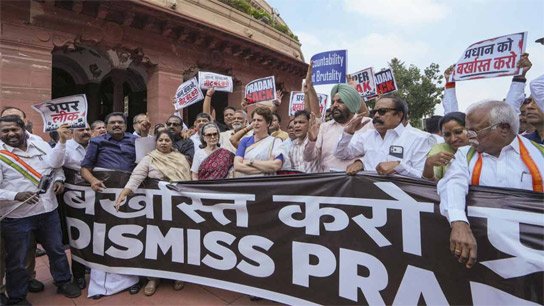 Protest in Parliament premises demanding resignation of Education Minister, opposition chants slogans, NDA MPs also join counter-protest