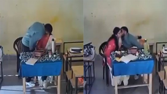 Teacher and teacher kiss passionately, passionate love in the classroom