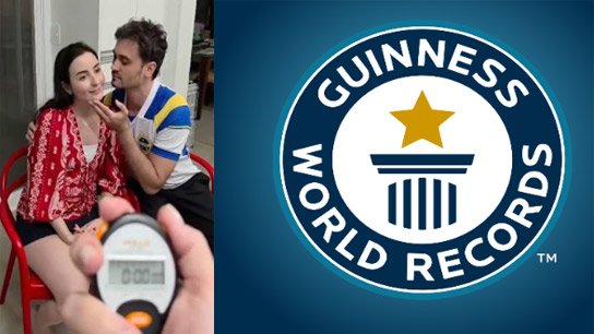 The couple forgot the pain of losing the World Cup with a world record, kissed 195 times in 30 seconds!