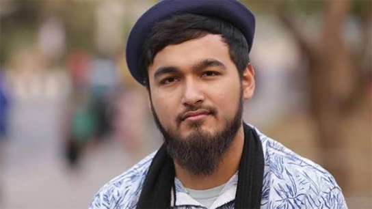 Noble sang 'Baba Kadadin' on his son's lap
