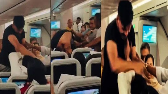 A fierce fight broke out mid-air on a Bangladesh-bound flight! Video of two passengers fighting goes viral
