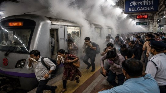 Metro fills with smoke as it enters Belgachia station; panic ensues, train services disrupted