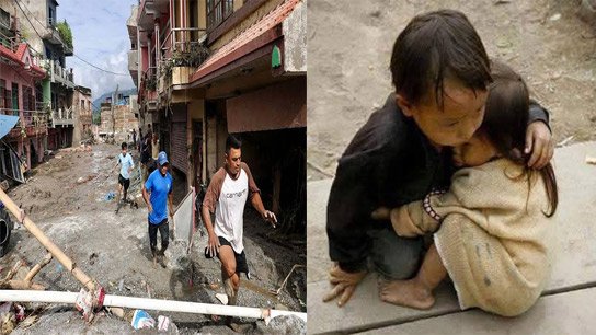 Two and a half year old sister being protected by her 4 year old brother in Nepal